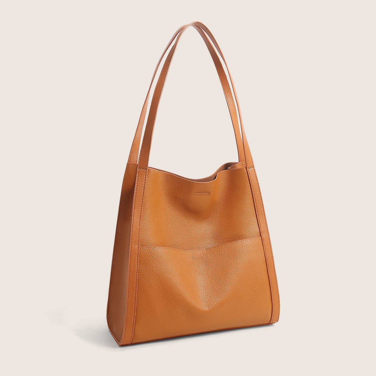 a brown leather bag on a white background 6