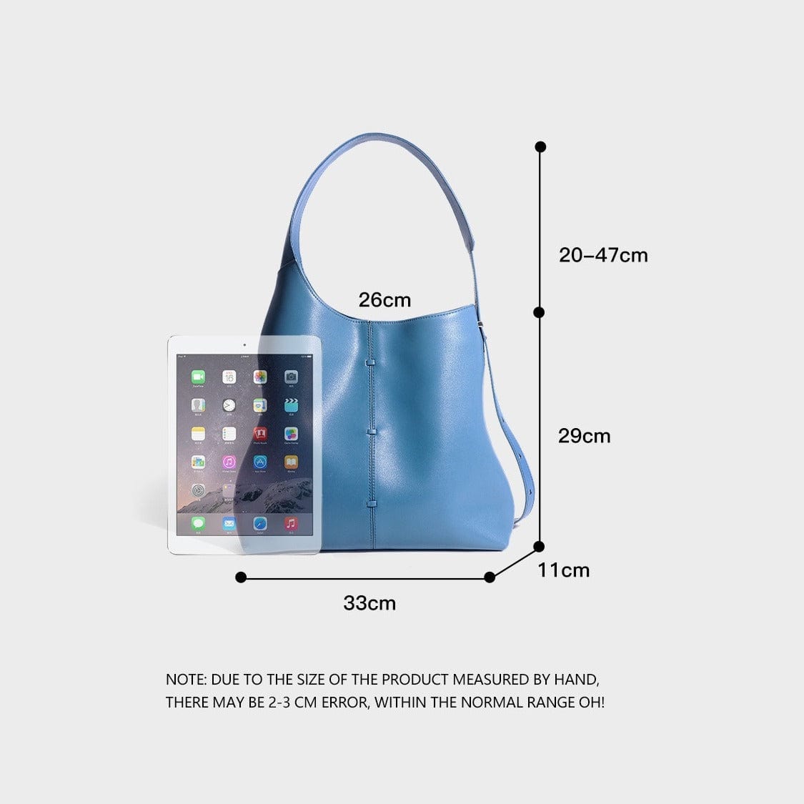 a blue purse with a tablet next to it4