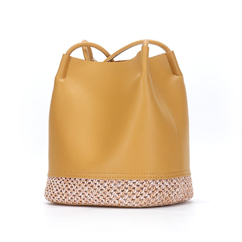a tan leather handbag on a white background 6