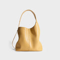 a yellow handbag on a white background6