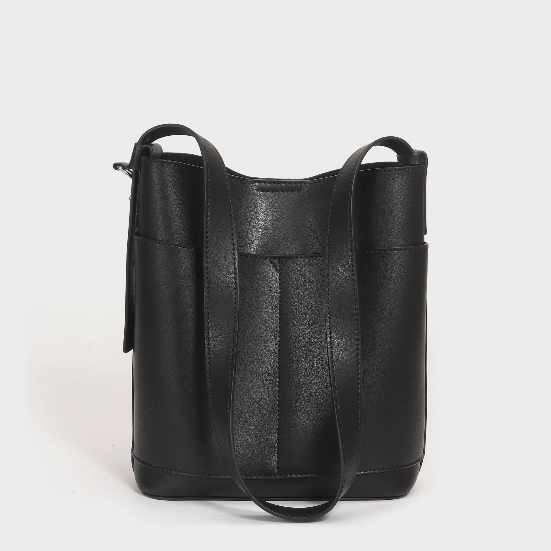 a black leather tote bag on a white background