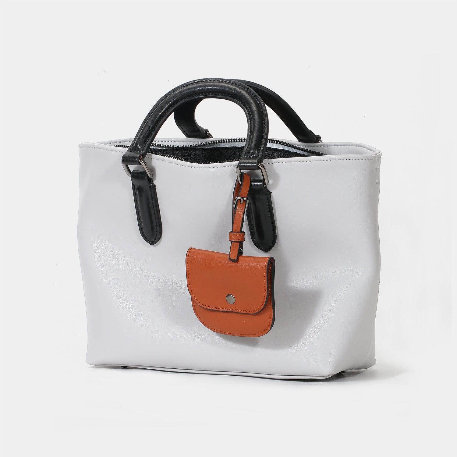 a white and orange purse with a black handle2